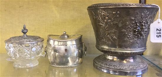 Pair of silver pillar candlesticks, embossed plated pedestal jardiniere & a small plated tea caddy